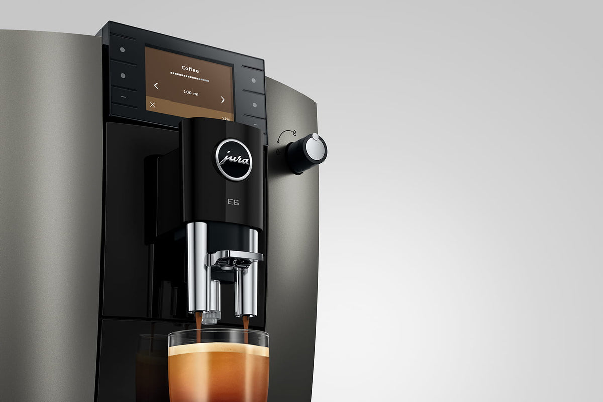 Coffee pouring from the JURA E6 spout