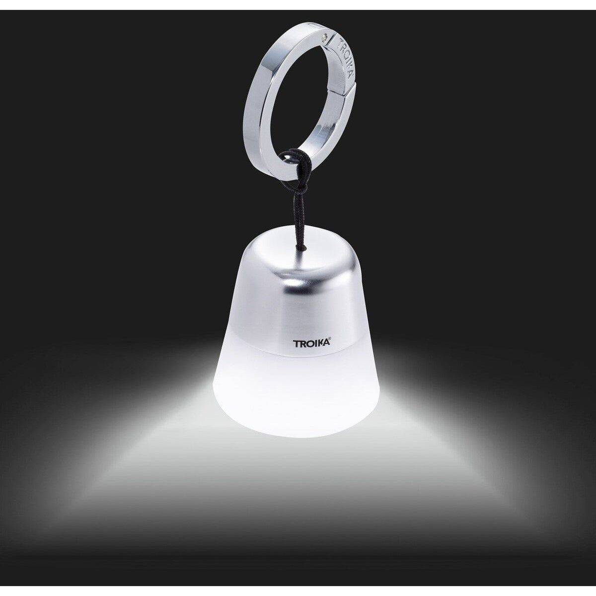 TROIKA mini LED bag light switched on, white light shining down